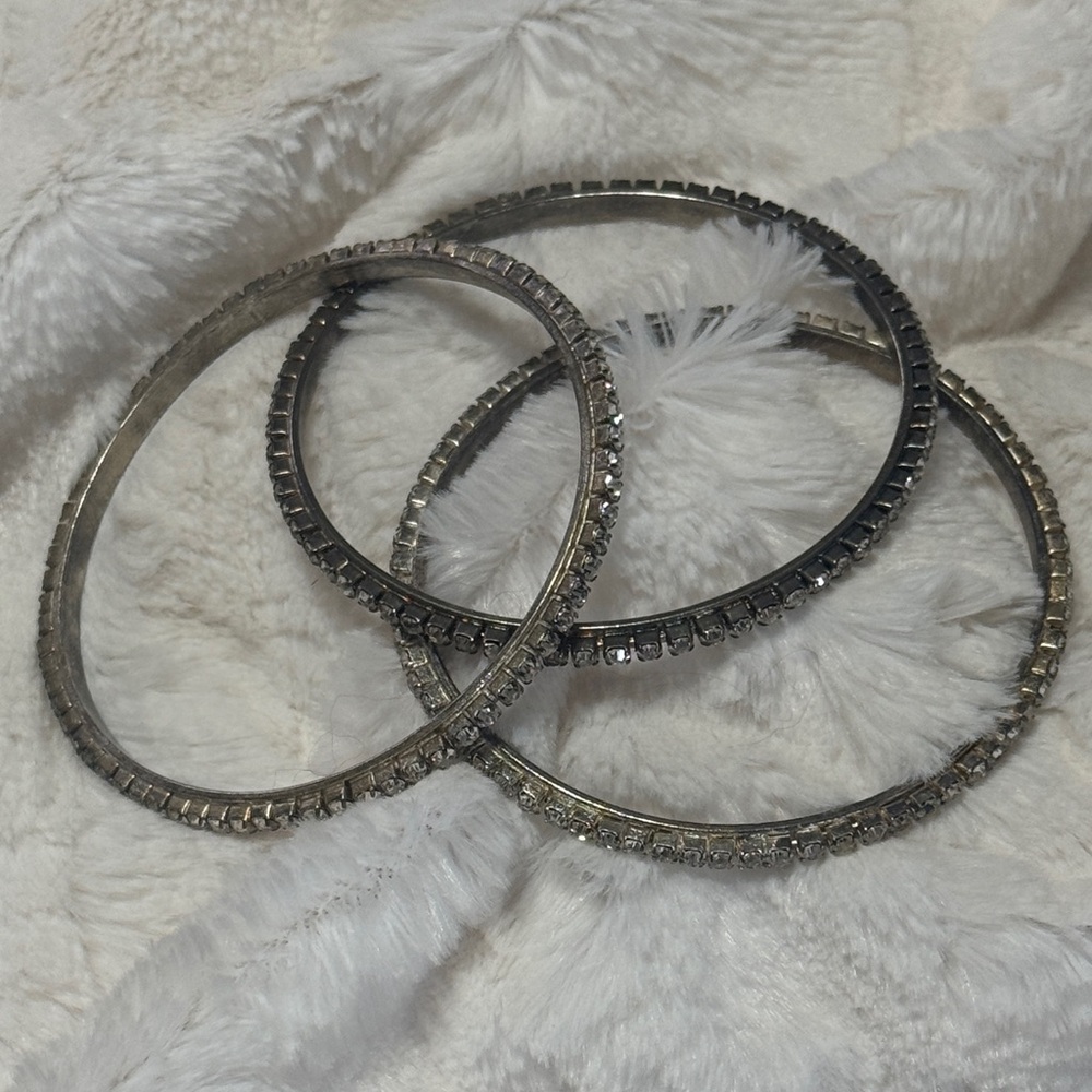 **3/$15** Set of 3 Silver-toned Rhinestone Bangle Bracelets.